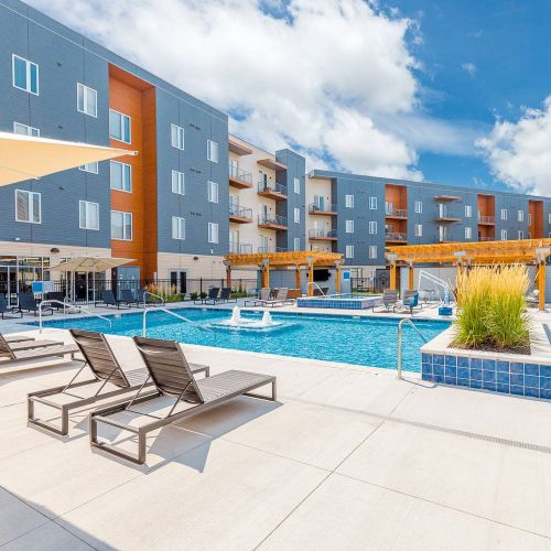 The Backyard at One North apartments pool and outdoor lounge