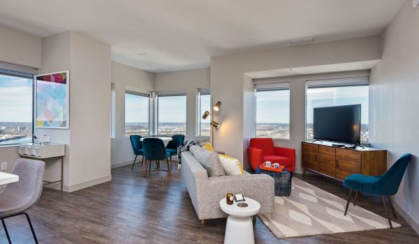 Commerce Tower apartment interior showcasing open floor plan and natural light