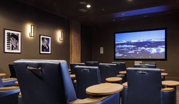 Avenue 81 apartment community movie theater