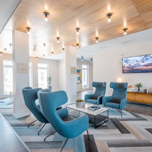 The Backyard at One North apartments community lounge and lobby