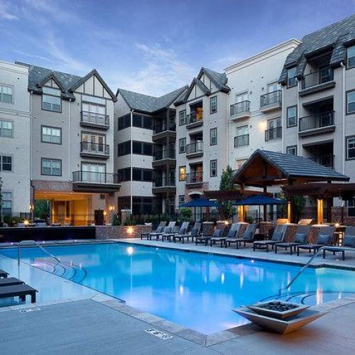 Mission 106 Apartments community pool and outdoor lounge