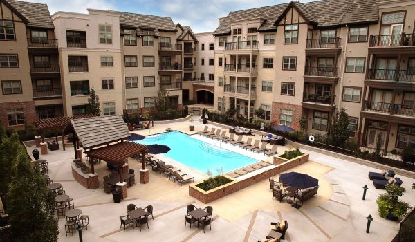 Mission 106 Apartments community pool and outdoor lounge