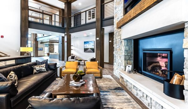 Wheatfield Village apartments community lounge with fireplace