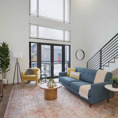 Westside Flats apartment living room and staircase to loft