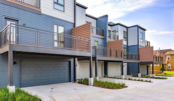 Westside Flats townhomes exterior with parking