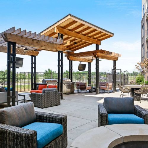 The District Flats apartment community outdoor lounge