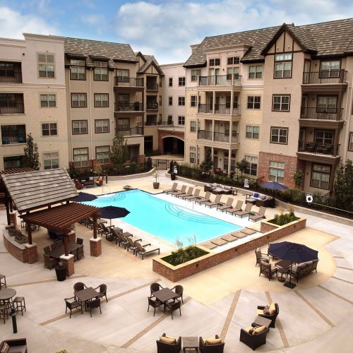 Mission 106 Apartments community pool and outdoor lounge