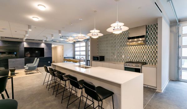 The Backyard at One North apartments community kitchen and entertainment space