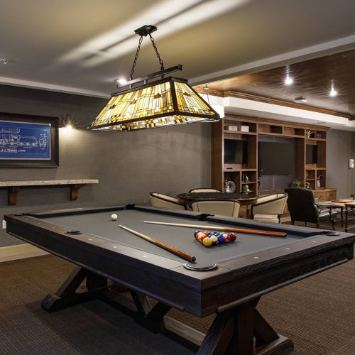 Avenue 81 apartment community billiards and game room