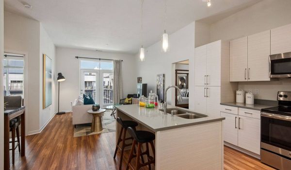 Avenue 80 apartment modern kitchen and living area