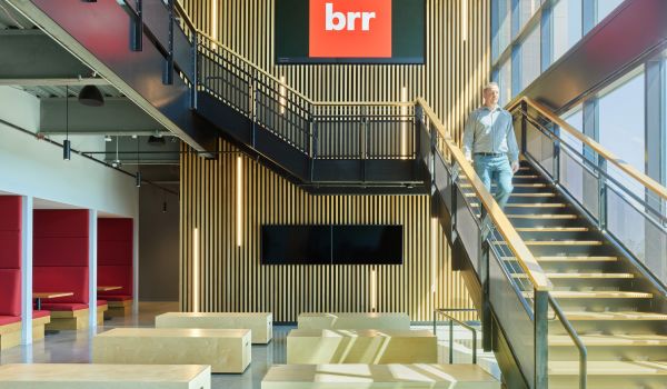 Avenue 82 interior lobby with two stories and staircase