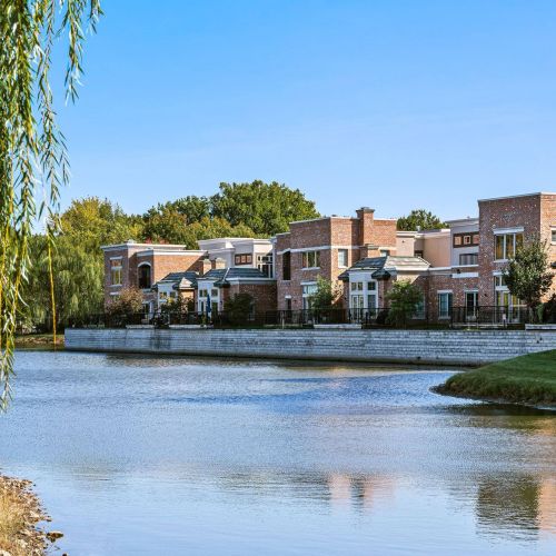 Mission 106 Apartments property exterior with large lake