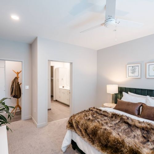 The Backyard at One North apartment bedroom with walk-in closet