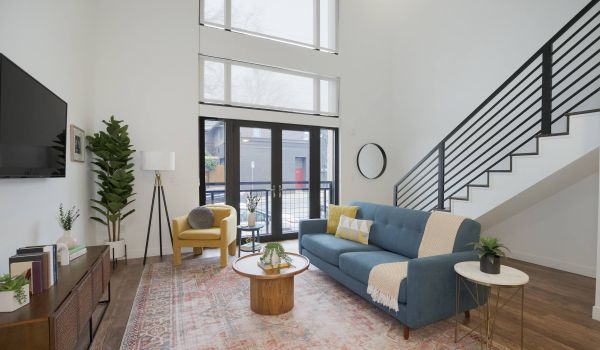 Westside Flats apartment living room and staircase to loft