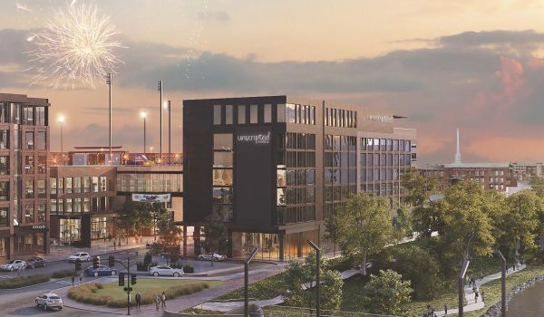Delano Ballpark District building and street view with fireworks